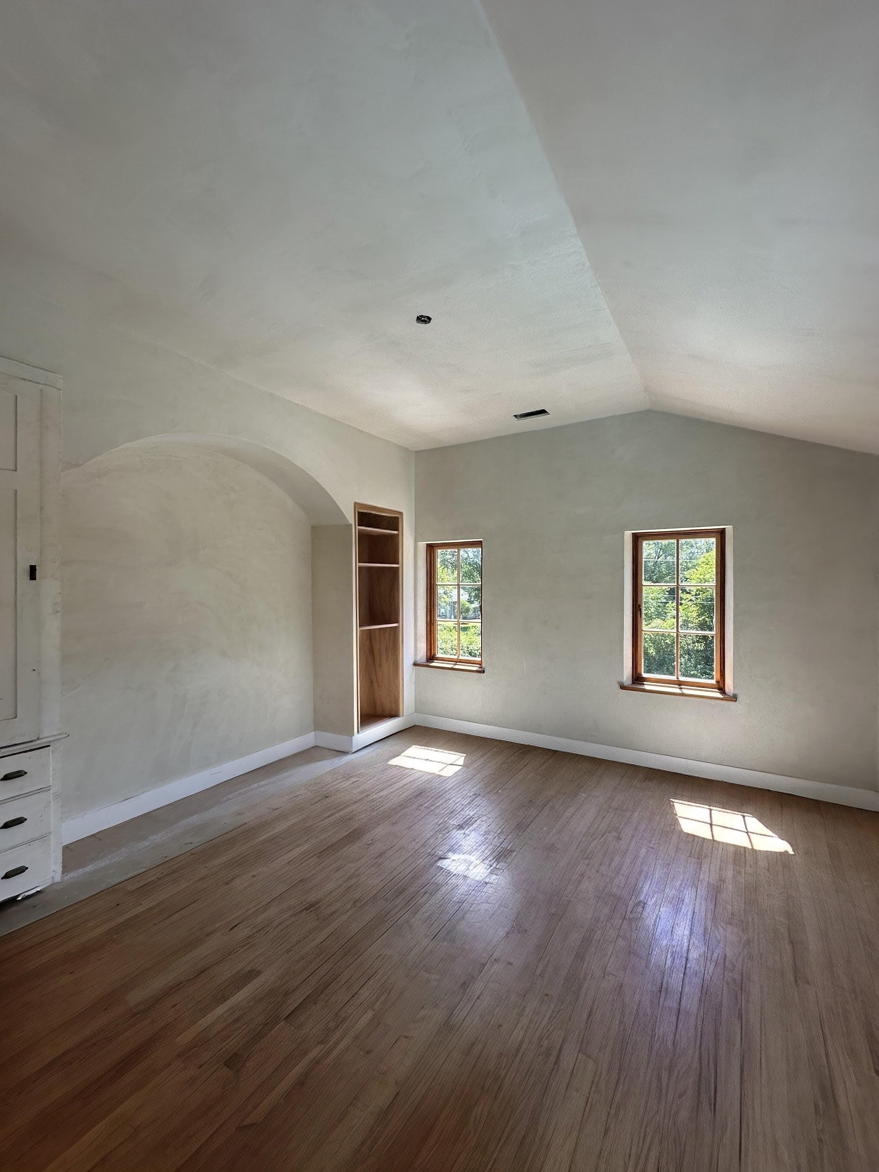 Old-world plaster finish over Imperial veneer base &mdash; subtle trowel movement